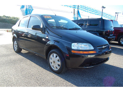 chevrolet aveo 2005 black sedan ls gasoline 4 cylinders front wheel drive automatic with overdrive 77627