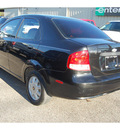 chevrolet aveo 2005 black sedan ls gasoline 4 cylinders front wheel drive automatic with overdrive 77627