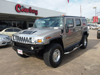 hummer h2 2007 tan suv gasoline 8 cylinders 4 wheel drive automatic with overdrive 77657