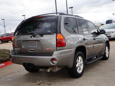 gmc envoy 2005 beige suv slt gasoline 6 cylinders rear wheel drive automatic 75070