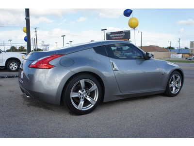 nissan 370z 2009 silver coupe gasoline 6 cylinders rear wheel drive 6 speed manual 76543