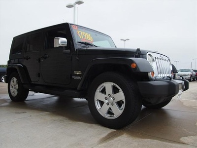jeep wrangler unlimited 2007 black suv sahara gasoline 6 cylinders rear wheel drive 77503