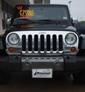 jeep wrangler unlimited 2007 black suv sahara gasoline 6 cylinders rear wheel drive 77503