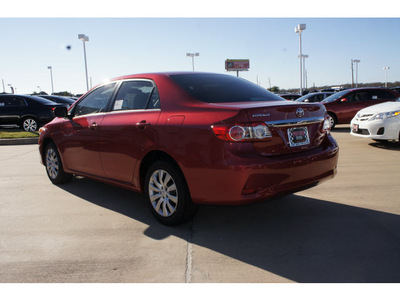 toyota corolla 2013 red sedan le gasoline 4 cylinders front wheel drive automatic 77469