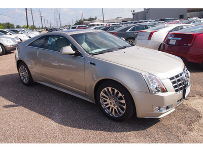cadillac cts 2013 beige coupe 3 6l premium gasoline 6 cylinders rear wheel drive automatic 77074