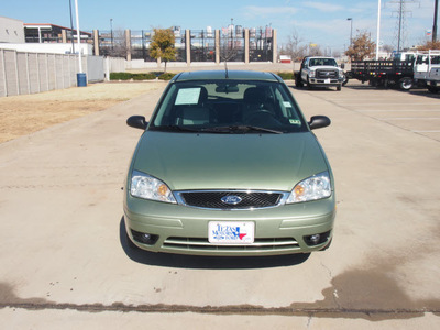 ford focus 2007 green hatchback zx5 ses gasoline 4 cylinders front wheel drive manual 76108