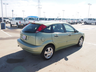 ford focus 2007 green hatchback zx5 ses gasoline 4 cylinders front wheel drive manual 76108