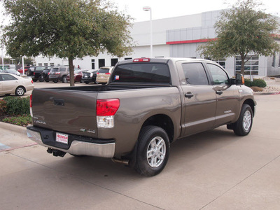 toyota tundra 2010 dk  green crewmax 4x4 flex fuel 8 cylinders 4 wheel drive automatic 76053