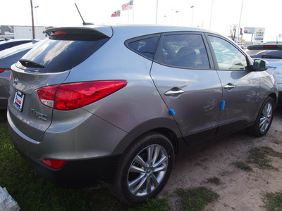 hyundai tucson 2013 gray limited gasoline 4 cylinders front wheel drive autostick 77065