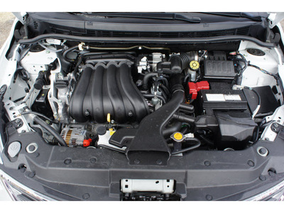 nissan versa 2012 white hatchback 1 8 s gasoline 4 cylinders front wheel drive 6 speed manual 78520