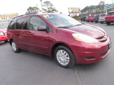 toyota sienna 2009 dk  red van le 7 passenger gasoline 6 cylinders front wheel drive automatic 32401