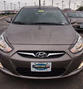 hyundai accent 2013 brown hatchback se gasoline 4 cylinders front wheel drive automatic 75075