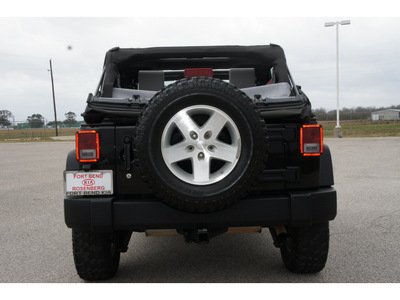 jeep wrangler unlimited 2009 black suv x gasoline 6 cylinders 4 wheel drive standard 77471