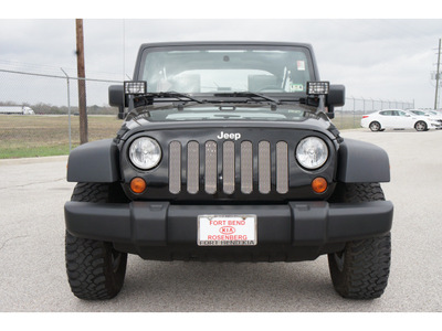 jeep wrangler unlimited 2009 black suv x gasoline 6 cylinders 4 wheel drive standard 77471