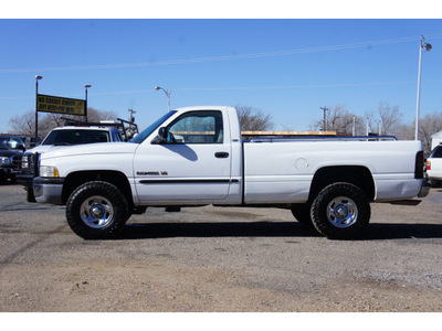 dodge ram 1500 2000 white pickup truck slt gasoline v8 4 wheel drive automatic 79065