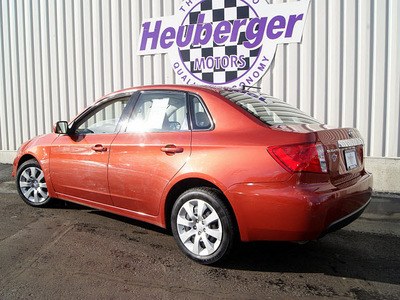 subaru impreza 2009 orange sedan 2 5i gasoline 4 cylinders all whee drive automatic 80905