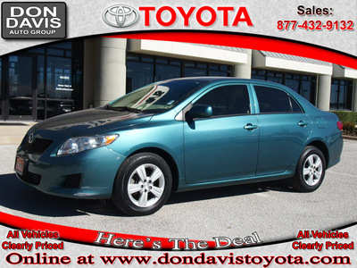 toyota corolla 2010 dk  green sedan le gasoline 4 cylinders front wheel drive automatic 76011