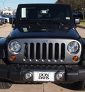 jeep wrangler unlimited 2013 black suv freedom edition gasoline 6 cylinders 4 wheel drive automatic 76011
