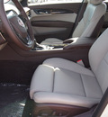 cadillac ats 2013 white sedan 2 0l premium gasoline 4 cylinders rear wheel drive automatic 77074