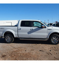 ford f 150 2013 white lariat flex fuel 8 cylinders 4 wheel drive automatic 73703
