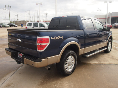 ford f 150 2011 dk  blue lariat gasoline 6 cylinders 4 wheel drive automatic with overdrive 77469