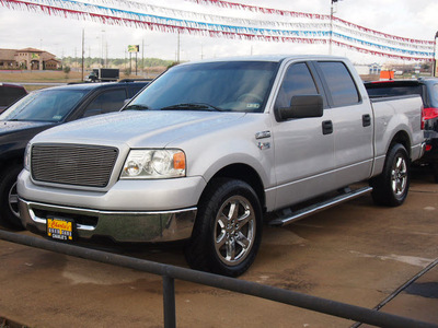 ford f 150 2006 silver xlt gasoline 8 cylinders rear wheel drive automatic with overdrive 77340