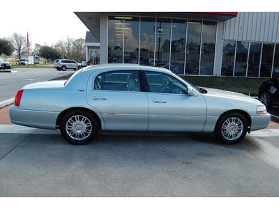 lincoln town car 2007 silver sedan signature limited 8 cylinders automatic 77706