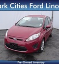 ford fiesta 2011 red hatchback se gasoline 4 cylinders front wheel drive automatic 75235