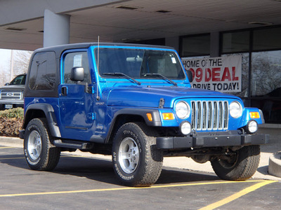 jeep wrangler 2003 blue suv sport gasoline 6 cylinders 4 wheel drive automatic with overdrive 61832