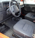 jeep wrangler 2001 orange suv sport gasoline 6 cylinders 4 wheel drive automatic 61832