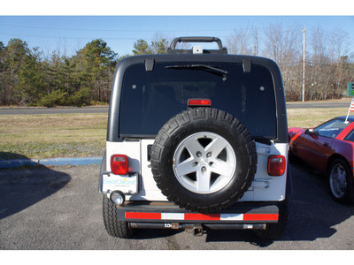 jeep wrangler 2004 stone white suv rubicon plow gasoline 6 cylinders 4 wheel drive automatic 07712