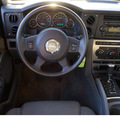 jeep commander 2007 black suv sport gasoline 6 cylinders rear wheel drive automatic 78028