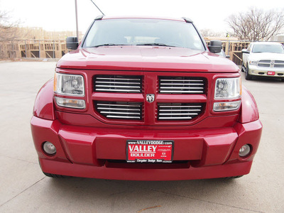 dodge nitro 2007 red suv r t gasoline 6 cylinders 4 wheel drive automatic 80301