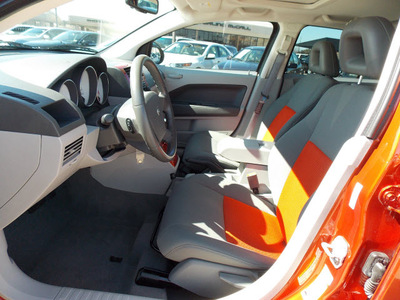 dodge caliber 2007 orange hatchback sxt gasoline 4 cylinders front wheel drive cont  variable trans  77074