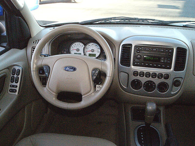 ford escape 2005 silver metallic suv limited gasoline 6 cylinders front wheel drive automatic 80911