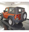 jeep wrangler 2011 orange suv sport gasoline 6 cylinders 4 wheel drive automatic with overdrive 77630