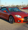 mitsubishi eclipse spyder 2012 orange gs sport gasoline 4 cylinders front wheel drive shiftable automatic 77074