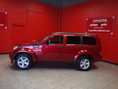 dodge nitro 2009 red suv slt gasoline 6 cylinders 2 wheel drive automatic 76116