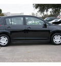 nissan versa 2012 black hatchback 1 8 s gasoline 4 cylinders front wheel drive not specified 77477