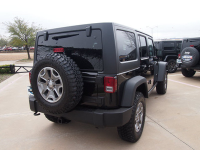 jeep wrangler unlimited 2013 black suv rubicon gasoline 6 cylinders 4 wheel drive not specified 75093