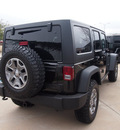 jeep wrangler unlimited 2013 black suv rubicon gasoline 6 cylinders 4 wheel drive not specified 75093