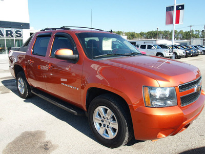 chevrolet avalanche 2007 orange lt gasoline 8 cylinders rear wheel drive automatic 77539