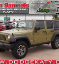 jeep wrangler unlimited 2013 green suv rubicon gasoline 6 cylinders 4 wheel drive automatic 77450