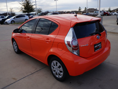 toyota prius c 2013 orange hatchback two hybrid 4 cylinders front wheel drive automatic 76049