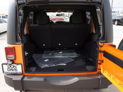 jeep wrangler unlimited 2012 orange suv sport gasoline 6 cylinders 4 wheel drive automatic 76011