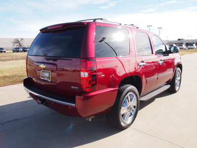 chevrolet tahoe 2010 dk  red suv ltz flex fuel 8 cylinders 4 wheel drive automatic 75007