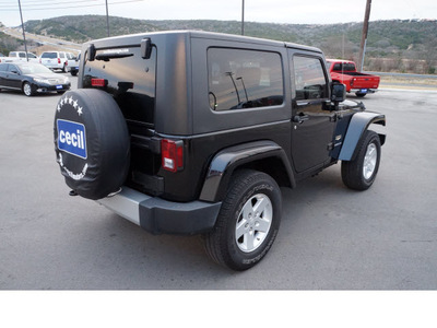 jeep wrangler 2009 black suv sahara gasoline 6 cylinders 4 wheel drive automatic 78028