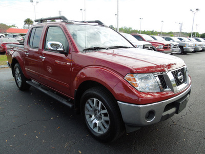 nissan frontier 2010 red le gasoline 6 cylinders 4 wheel drive automatic 34474