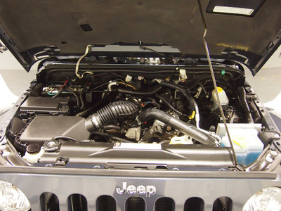 jeep wrangler 2008 blue suv sahara gasoline 6 cylinders 4 wheel drive 6 speed manual 75219