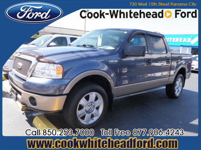 ford f 150 2006 dk  blue lariat gasoline 8 cylinders 4 wheel drive automatic with overdrive 32401